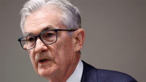 Fed’s Powell notes inflation is easing but downplays discussion of interest rate cuts